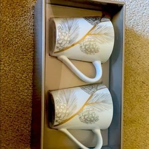 2 Newly opened antique mugs